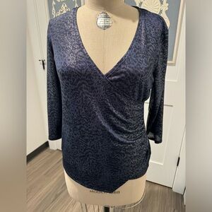 NWT Jennifer Lopez women’s asymmetrical top with animal print.  Size large.